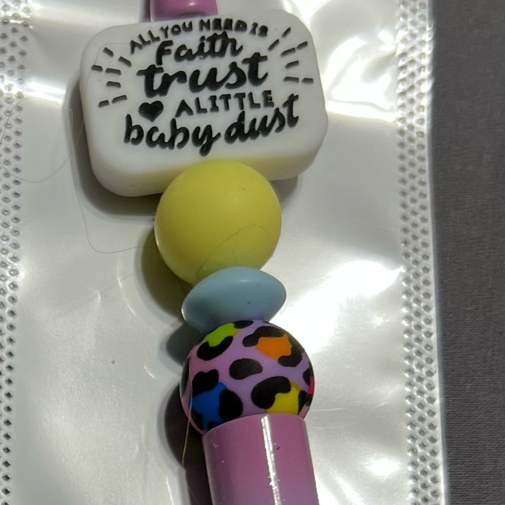 Colorful pen with leopard bead and a faith focal bead.